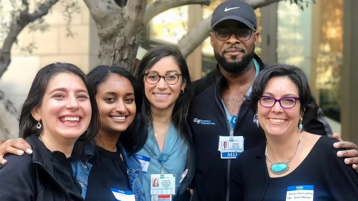 A group of facutly and housestaff at an event for the minority housestaff organization