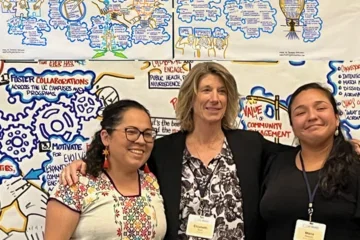 Attendees pose for photo at UC BRAID retreat