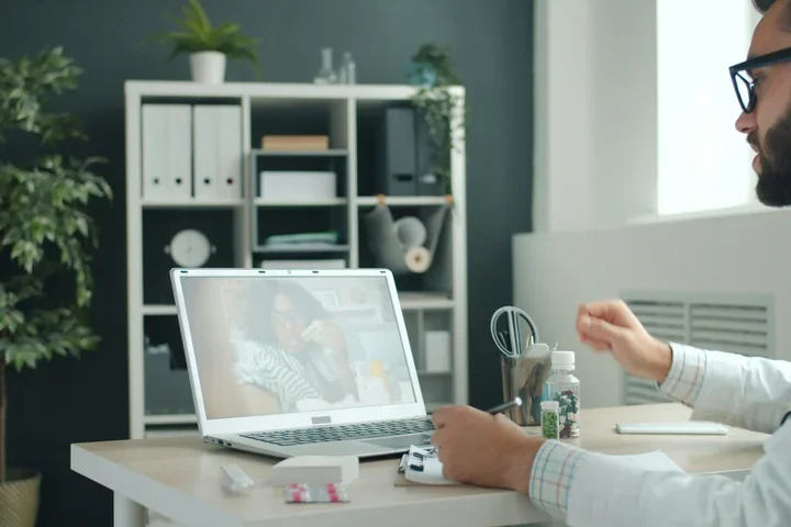 Doctor consults patient during a telehealth visit