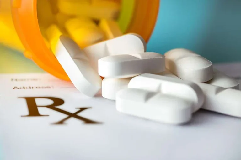 Image of pills spilling out of pill bottle