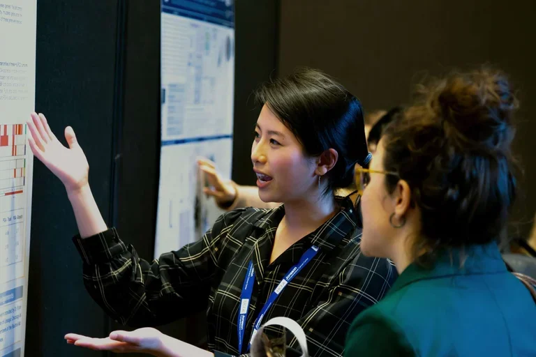 young-female-researcher-poster-session-retreat