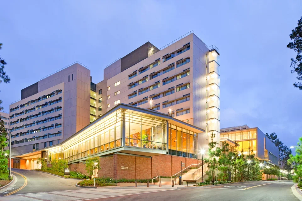 external of building in an evening sky with the building lights turned on